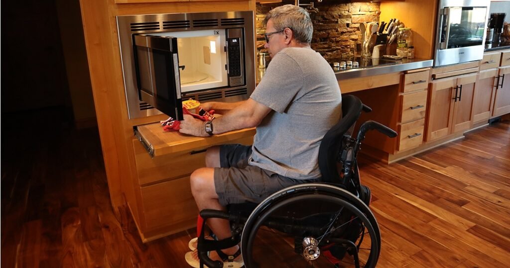A liveable-kitchen layout from Australian guidelines. Note the spacious 1550mm clearance around benches and 800mm stove width, allowing wheelchair access

